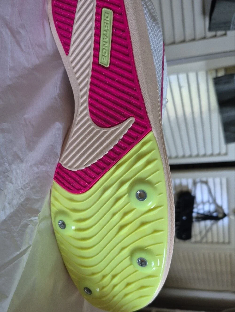 Nike White Athletic Shoes with Pink Swoosh